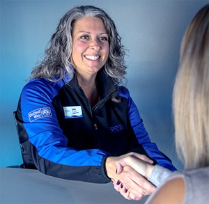 Lisa-Cooper-Central-Manager-2 Lisa_Cooper_Handshake