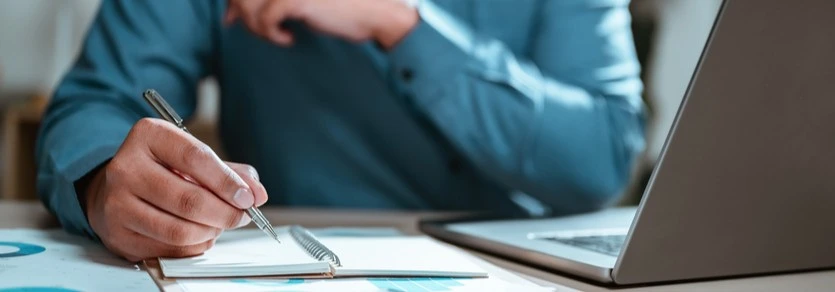 A person taking notes