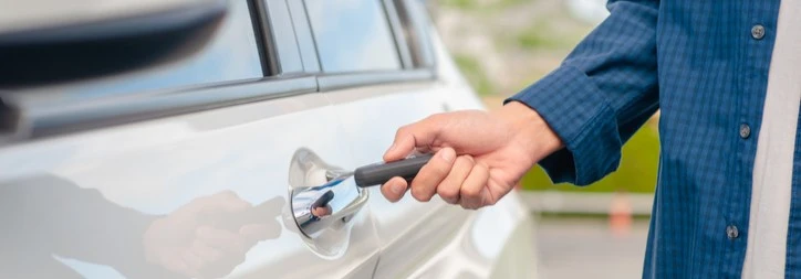 Someone unlocking their car