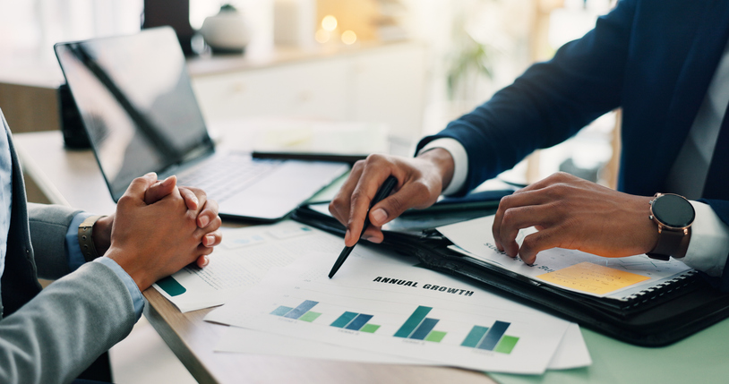 investment banker explaining benefits