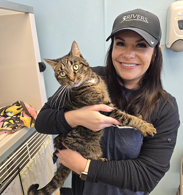 3Rivers employee volunteering at an Animal Shelter.