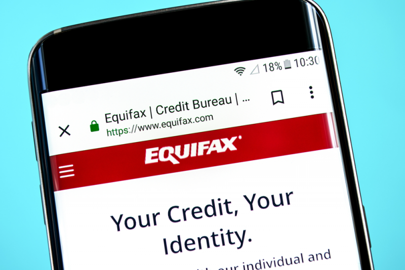 Equifax website displayed on mobile phone.